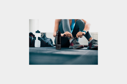 94620 stock photo woman tying shoelaces at gym 269242565 copiar