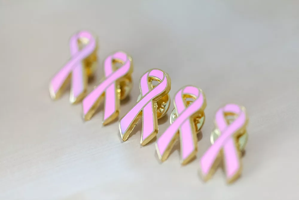 pink pins as symbol of breast cancer awareness mon 2022 11 14 05 33 19 utc